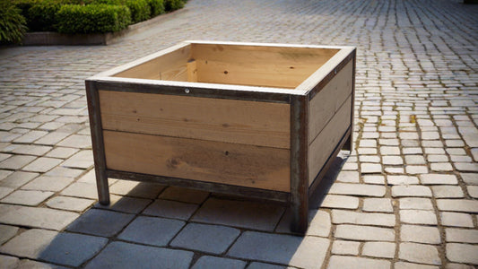 Raised box planter made of wood and steel